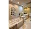 Bathroom features a soaking tub and a vanity sink at 624 Dogwood Dr. S, Garden City Beach, SC 29576