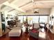 Bright, open-concept living and dining area with beautiful hardwood floors and plenty of natural light at 624 Dogwood Dr. S, Garden City Beach, SC 29576