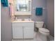Cozy bathroom with white cabinets, modern fixtures, and clean design at 654 Blue Bird Ln., Murrells Inlet, SC 29576