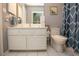 Well-maintained bathroom with modern vanity and blue accent details at 654 Blue Bird Ln., Murrells Inlet, SC 29576
