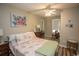 Comfortable bedroom featuring a ceiling fan and laminate wood flooring at 654 Blue Bird Ln., Murrells Inlet, SC 29576