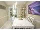 Bright dining room with a modern chandelier and stylish decor, ideal for Gathering meals at 654 Blue Bird Ln., Murrells Inlet, SC 29576