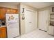 Clean kitchen area with pantry and appliances at 654 Blue Bird Ln., Murrells Inlet, SC 29576