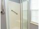 Accessible shower with grab bar and sliding glass doors for convenience at 654 Blue Bird Ln., Murrells Inlet, SC 29576