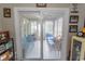 View of sunroom with comfortable seating, creating a relaxing indoor-outdoor space at 654 Blue Bird Ln., Murrells Inlet, SC 29576
