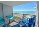 Relaxing balcony featuring comfortable seating and stunning ocean views on a beautiful sunny day at 7200 N Ocean Blvd. # 1160, Myrtle Beach, SC 29572