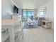 Inviting living room featuring coastal decor, stylish furniture, and a sliding glass door to the balcony with ocean views at 7200 N Ocean Blvd. # 1160, Myrtle Beach, SC 29572