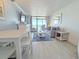 Inviting living room featuring coastal decor, stylish furniture, and a sliding glass door to the balcony with ocean views at 7200 N Ocean Blvd. # 1160, Myrtle Beach, SC 29572