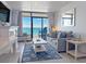Cozy living room featuring ocean view, sofa and nautical themed decorations at 7200 N Ocean Blvd. # 1160, Myrtle Beach, SC 29572