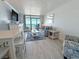 Bright living room with balcony, comfortable seating, and stylish decor at 7200 N Ocean Blvd. # 1160, Myrtle Beach, SC 29572