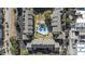 An aerial view showcases the community pool nestled between condominium buildings at 7700 Porcher Dr. # 3207, Myrtle Beach, SC 29572
