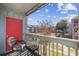 Relaxing balcony view with chair, table, and a pleasant outdoor outlook, offering a cozy and inviting space at 7700 Porcher Dr. # 3207, Myrtle Beach, SC 29572