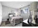 Comfortable bedroom with a large window, soft lighting, and stylish decor, perfect for relaxation at 7700 Porcher Dr. # 3207, Myrtle Beach, SC 29572
