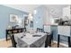 Charming dining area with pendant lighting and stylish table setting, perfect for gatherings at 7700 Porcher Dr. # 3207, Myrtle Beach, SC 29572