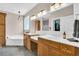 Primary bathroom featuring a double vanity, soaking tub, and natural light at 8013 Wacobee Dr., Myrtle Beach, SC 29579