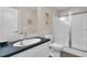 Bathroom featuring a vanity with solid surface countertop, toilet, and walk-in shower with glass door at 8013 Wacobee Dr., Myrtle Beach, SC 29579