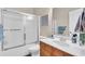 Neutral toned bathroom featuring a vanity with updated fixtures and shower at 8013 Wacobee Dr., Myrtle Beach, SC 29579