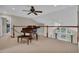 Spacious loft area with a baby grand piano overlooking the well manicured backyard at 8013 Wacobee Dr., Myrtle Beach, SC 29579