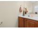 Bathroom with wood cabinet vanity and stylish decor at 864 Barn Owl Ct. # 864, Myrtle Beach, SC 29579