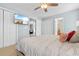 Relaxing bedroom featuring a TV, ceiling fan, closet and comfortable bedding for a peaceful sleep at 864 Barn Owl Ct. # 864, Myrtle Beach, SC 29579