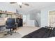 Spacious bedroom with carpet, ceiling fan, and staircase leading to another level at 864 Barn Owl Ct. # 864, Myrtle Beach, SC 29579