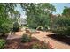 A view of the common area with a water feature, benches, and landscaping at 864 Barn Owl Ct. # 864, Myrtle Beach, SC 29579