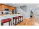 Kitchen featuring an island with bar seating, wood cabinets, and stainless steel appliances at 864 Barn Owl Ct. # 864, Myrtle Beach, SC 29579