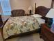 Bedroom showcasing a bed with floral bedding and traditional furnishings at 927 Edge Dr., North Myrtle Beach, SC 29582