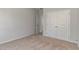 Bedroom with neutral carpet and a set of double doors to closet or storage space at 1004 Woodside Dr., Conway, SC 29526
