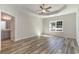 This bedroom features beautiful wood flooring and lots of natural light at 1004 Woodside Dr., Conway, SC 29526