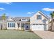 Charming one-story home with brick driveway, manicured lawn, and attached two-car garage at 1004 Woodside Dr., Conway, SC 29526