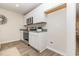 Modern kitchen with stainless steel appliances and granite countertops at 1012 Garden Sprout Dr, Galivants Ferry, SC 29544