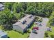 Aerial view showcasing the building, landscaping, and ample parking space at 10301 North Kings Hwy. # 21-4, Myrtle Beach, SC 29572