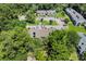 Aerial view of multi-Gathering residential complex surrounded by lush trees and ample parking at 10301 North Kings Hwy. # 21-4, Myrtle Beach, SC 29572