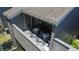 Cozy balcony with comfortable seating, a stylish rug, and shaded privacy at 10301 North Kings Hwy. # 21-4, Myrtle Beach, SC 29572