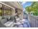 Relaxing balcony with outdoor seating and a cozy rug at 10301 North Kings Hwy. # 21-4, Myrtle Beach, SC 29572