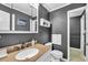 Bathroom showcasing a granite vanity, framed mirror, and neutral color palette, creating a soothing and functional space at 10301 North Kings Hwy. # 21-4, Myrtle Beach, SC 29572