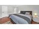 A peaceful bedroom with a large bed, soft lighting, and neutral colors, offering a serene and comfortable retreat at 10301 North Kings Hwy. # 21-4, Myrtle Beach, SC 29572