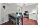 Cozy dining area with a modern table set and workstation offering a flexible living space at 10301 North Kings Hwy. # 21-4, Myrtle Beach, SC 29572