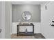 Charming foyer with a console table, decorative mirror, and tiled floor; offers a welcoming entrance at 10301 North Kings Hwy. # 21-4, Myrtle Beach, SC 29572
