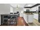 Open floor plan integrates dining area, work space and kitchen with granite countertops for modern living at 10301 North Kings Hwy. # 21-4, Myrtle Beach, SC 29572