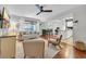 Inviting living room features a contemporary design, comfortable seating, and sliding glass doors to the balcony at 10301 North Kings Hwy. # 21-4, Myrtle Beach, SC 29572