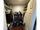 Well-organized walk-in closet with shelving, hanging rods, and shoe rack for optimal storage at 10301 North Kings Hwy. # 21-4, Myrtle Beach, SC 29572