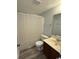 Bathroom with vanity and shower at 1101 2Nd Ave. N # 403, Surfside Beach, SC 29575