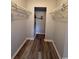 Walk-in closet with ample shelving and modern flooring at 1101 2Nd Ave. N # 403, Surfside Beach, SC 29575