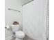 Clean bathroom with a neutral color palette and decorative shower curtain at 130 Puffin Dr. # 2B, Pawleys Island, SC 29585