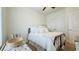 Inviting bedroom with a comfortable bed, white walls, carpet, and a ceiling fan at 130 Puffin Dr. # 2B, Pawleys Island, SC 29585
