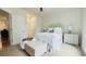 Bright main bedroom featuring neutral tones, carpet flooring, and serene decor at 130 Puffin Dr. # 2B, Pawleys Island, SC 29585