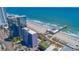 Beautiful aerial view of oceanfront condos, pier, and the pristine sandy beach at 1304 N Ocean Blvd. # S-801, Myrtle Beach, SC 29577