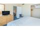 Inviting bedroom with dresser, TV, and closet at 1304 N Ocean Blvd. # S-801, Myrtle Beach, SC 29577